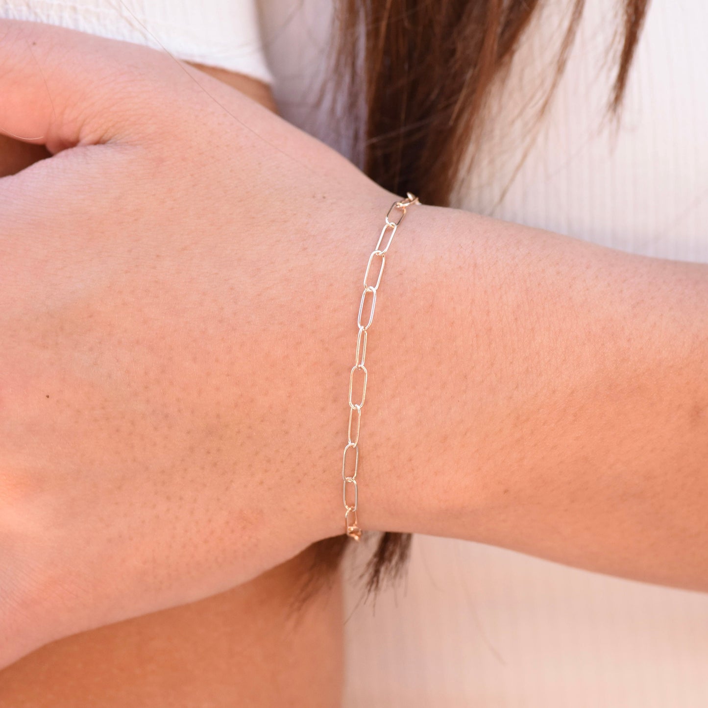 Minimalist 14K solid gold paper clip chain bracelet, 3mm wide. Perfect for everyday wear, stacking, or gifting. Durable, elegant, and timeless.