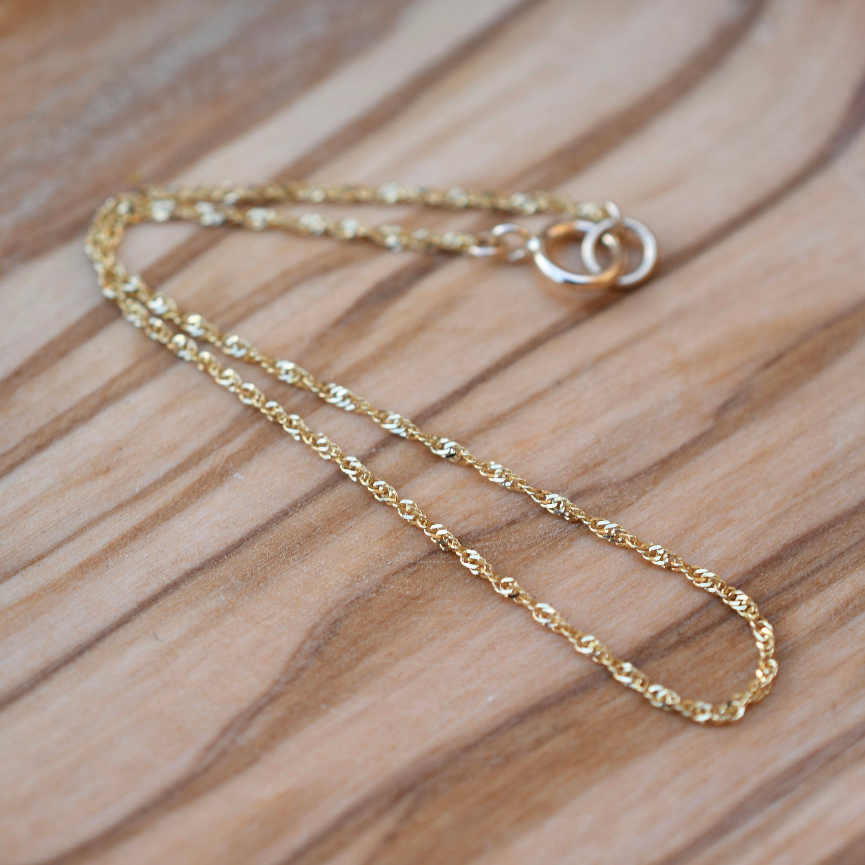 14K gold twisted chain bracelet for everyday wear