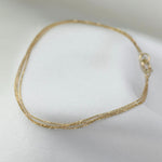 14K Gold Delicate Triple Strand Bracelet - Sash Jewelry