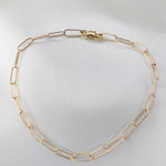 Minimalist 14K solid gold paper clip chain bracelet, 3mm wide. Perfect for everyday wear, stacking, or gifting. Durable, elegant, and timeless.
