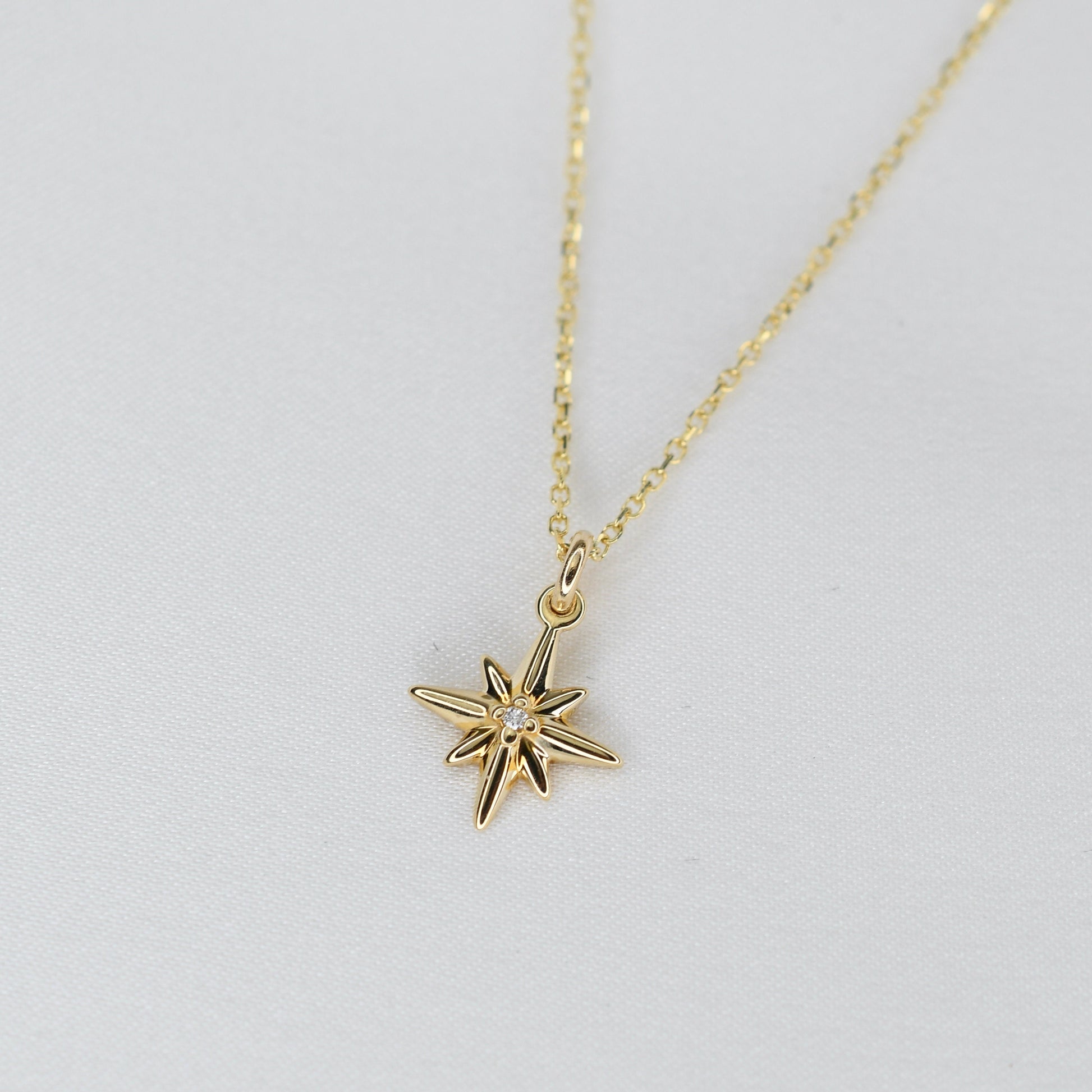 Shine bright with this dainty 14K solid gold North Star necklace, designed to symbolize guidance, protection, and inspiration.