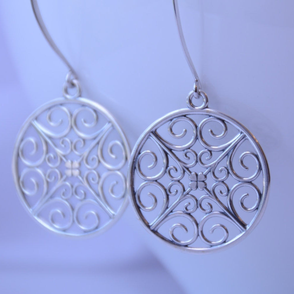 Sterling silver drop earrings by Sash Jewelry featuring modern minimalist design for everyday wear.