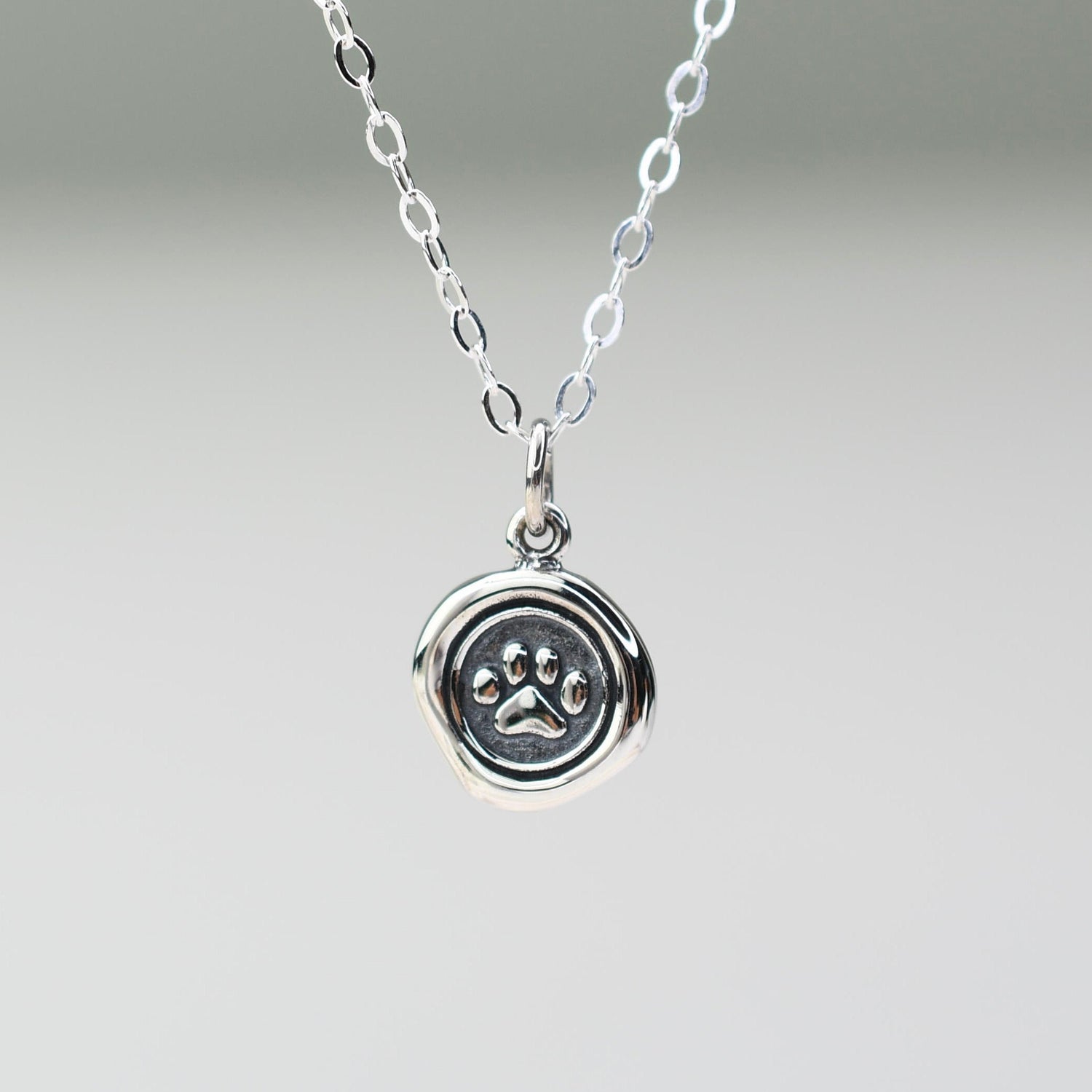 paw necklace 
