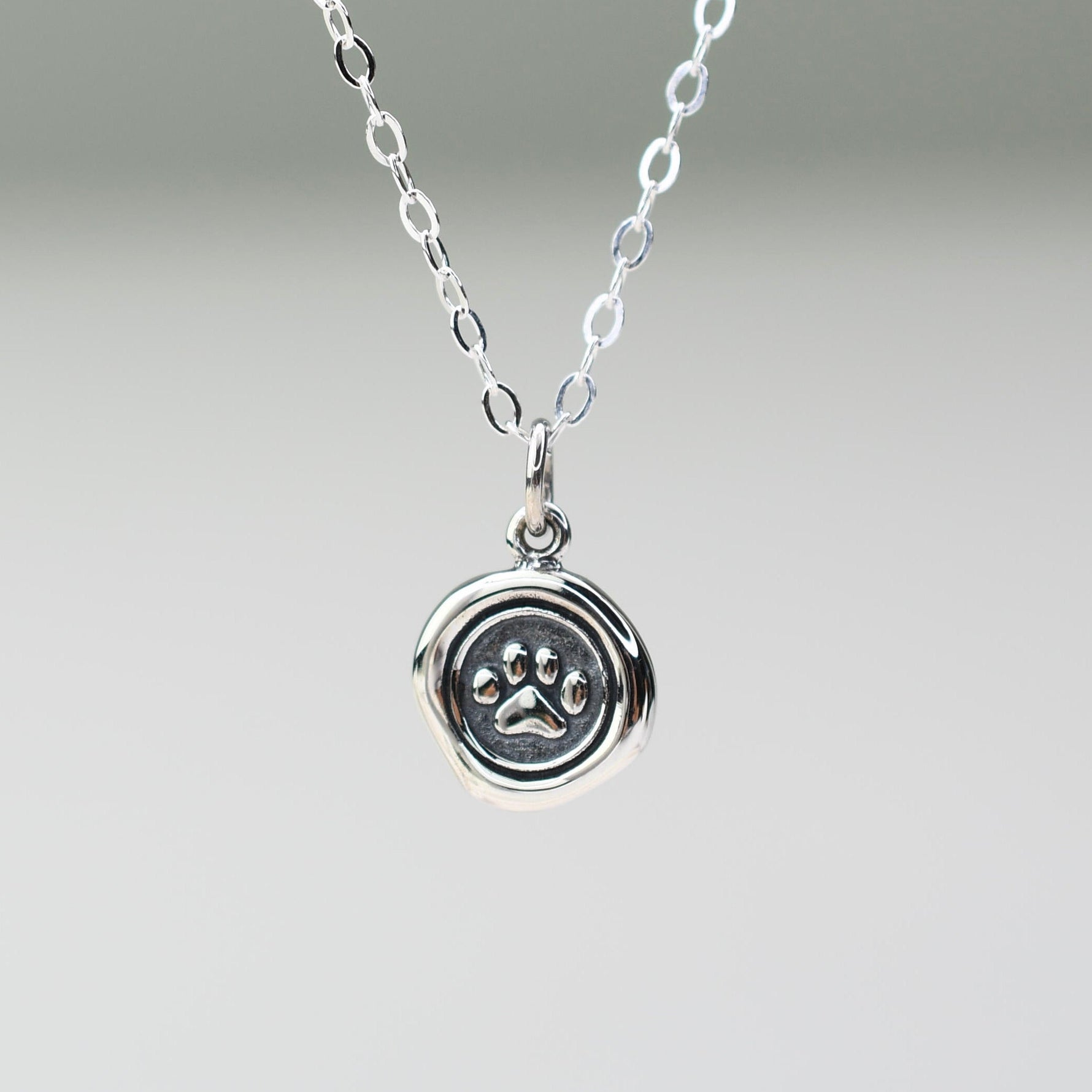 paw necklace 
