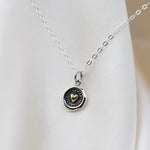 Sterling silver and bronze small heart necklace with wax seal heart charm by Sash Jewelry, featuring detailed metalwork and delicate chain.