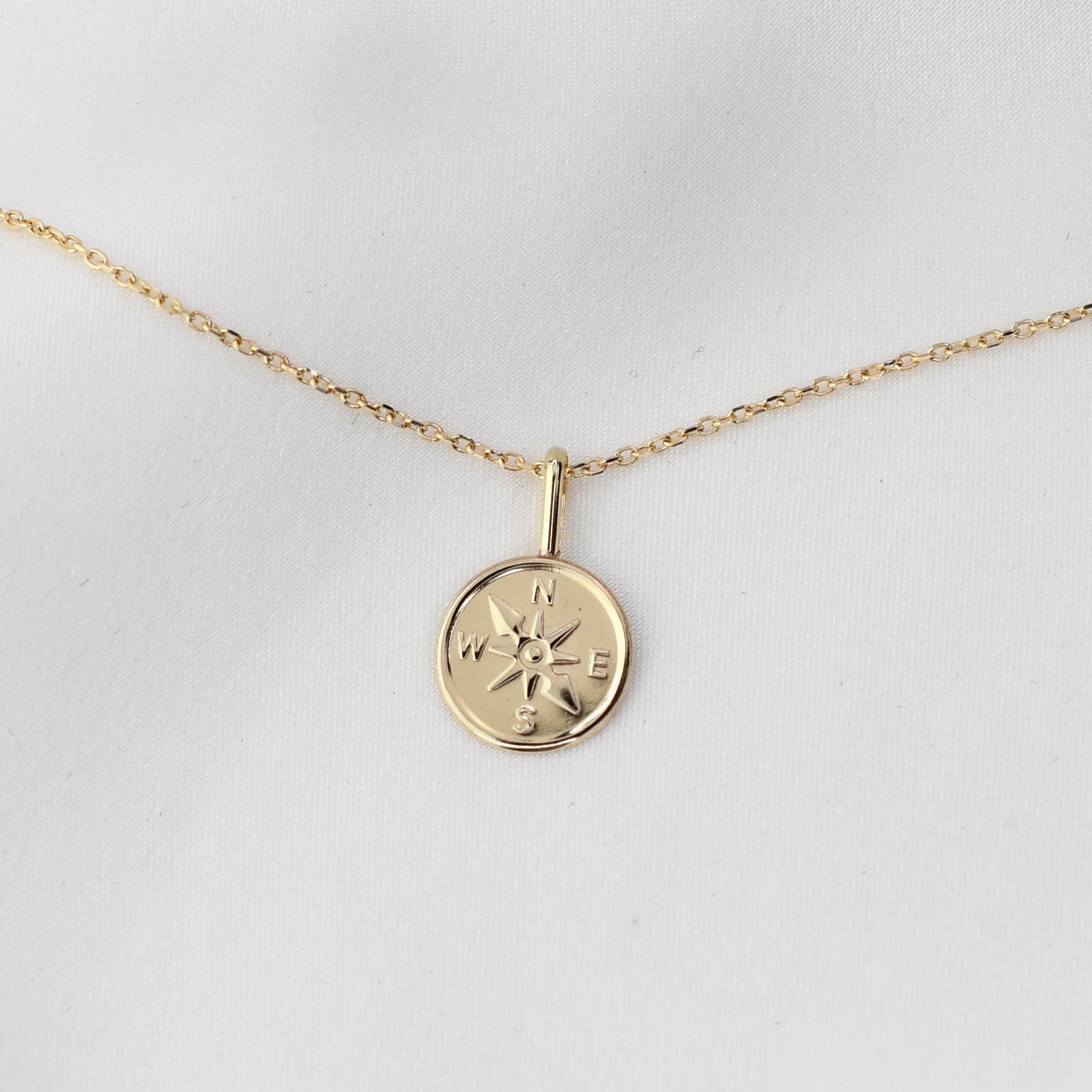 14k solid gold necklace with a 14k solid gold compass pendant
