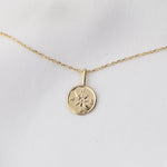 14k solid gold necklace with a 14k solid gold compass pendant