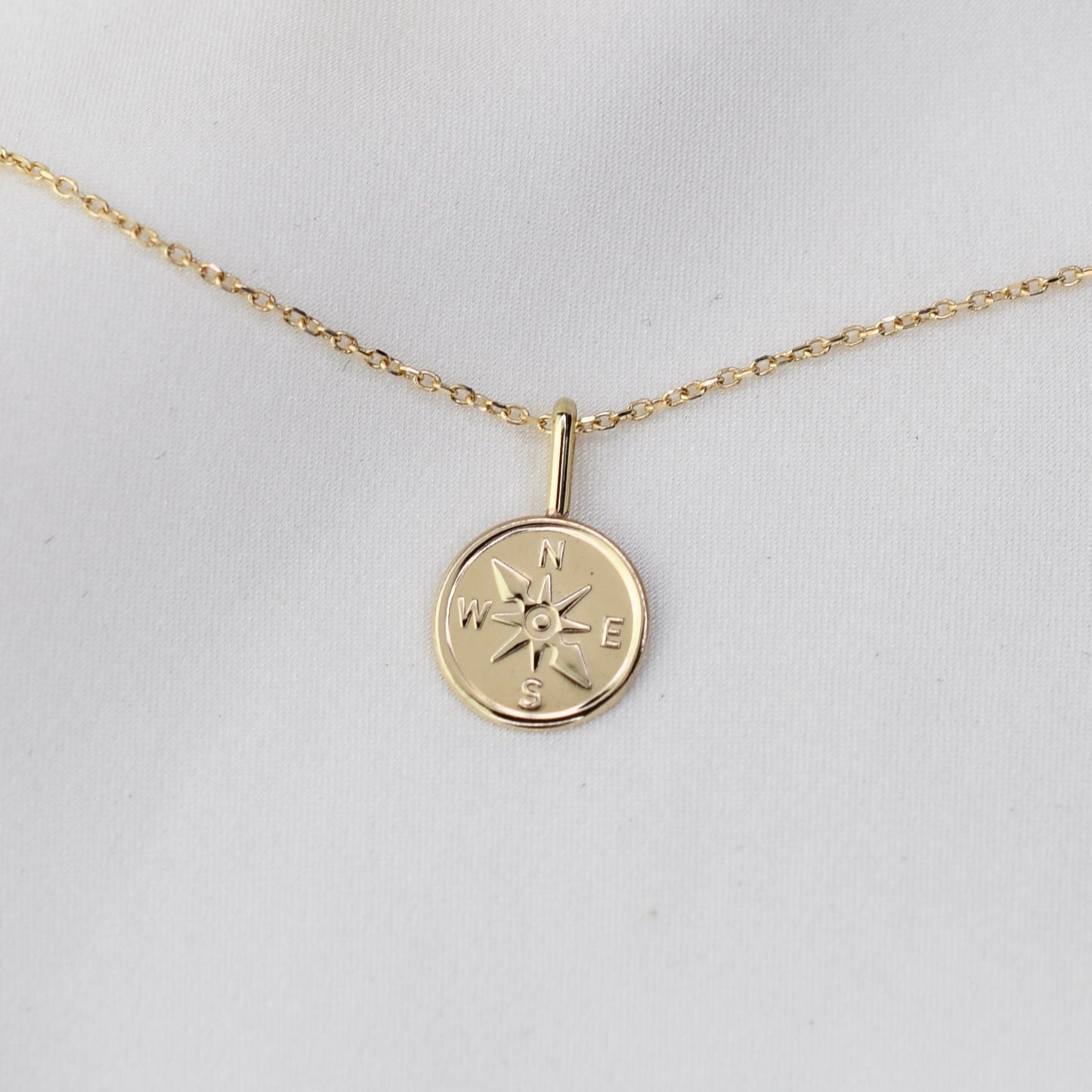 Gold necklace with a compass pendant solid gold 14k