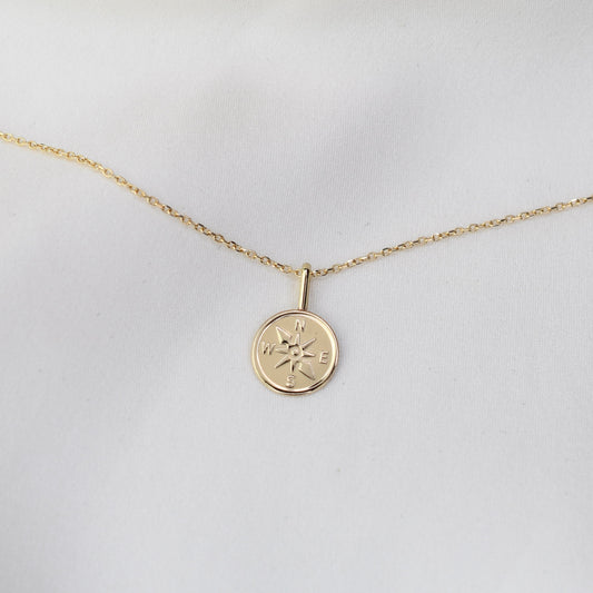 Gold necklace with a compass pendant 14k