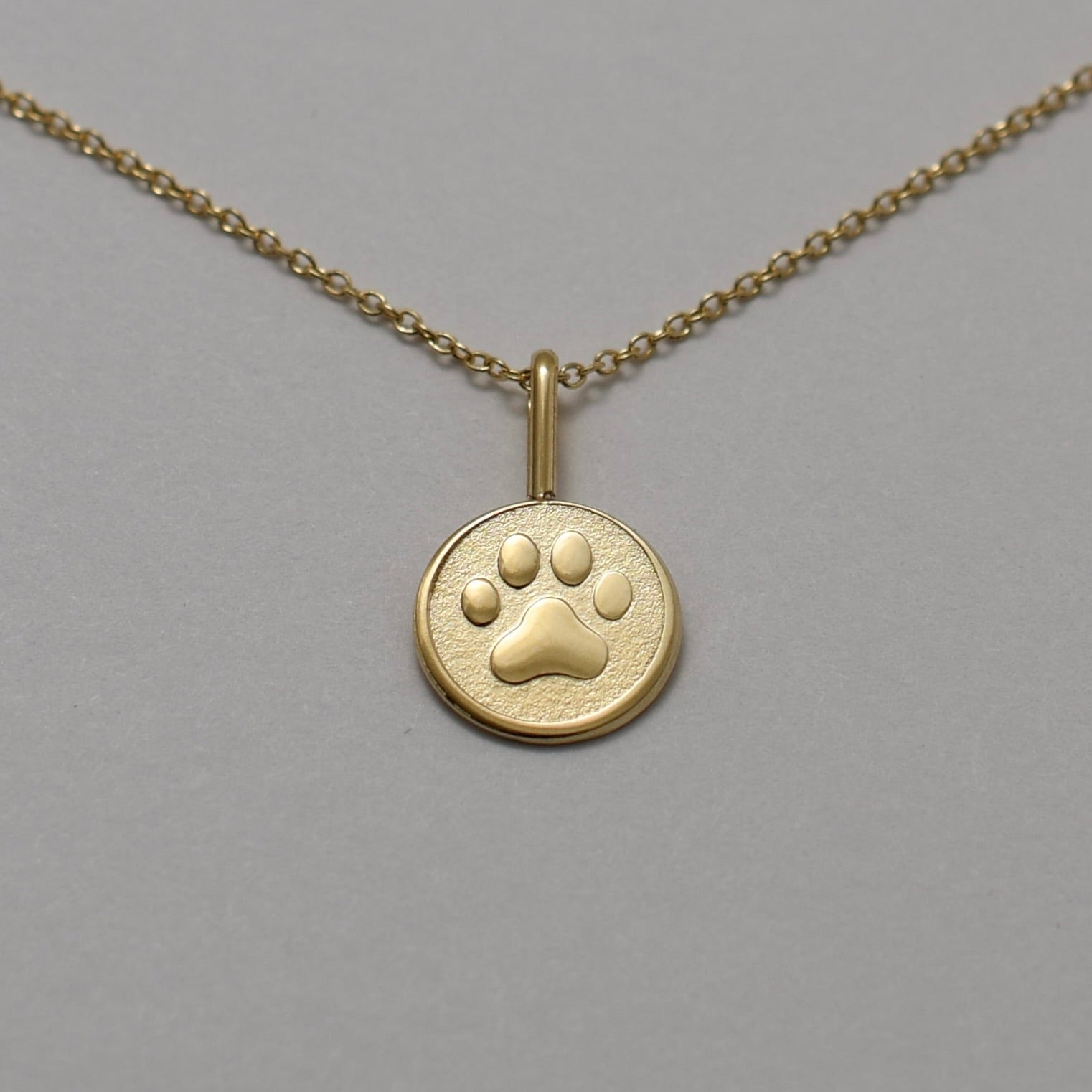 14k gold paw charm necklace 
