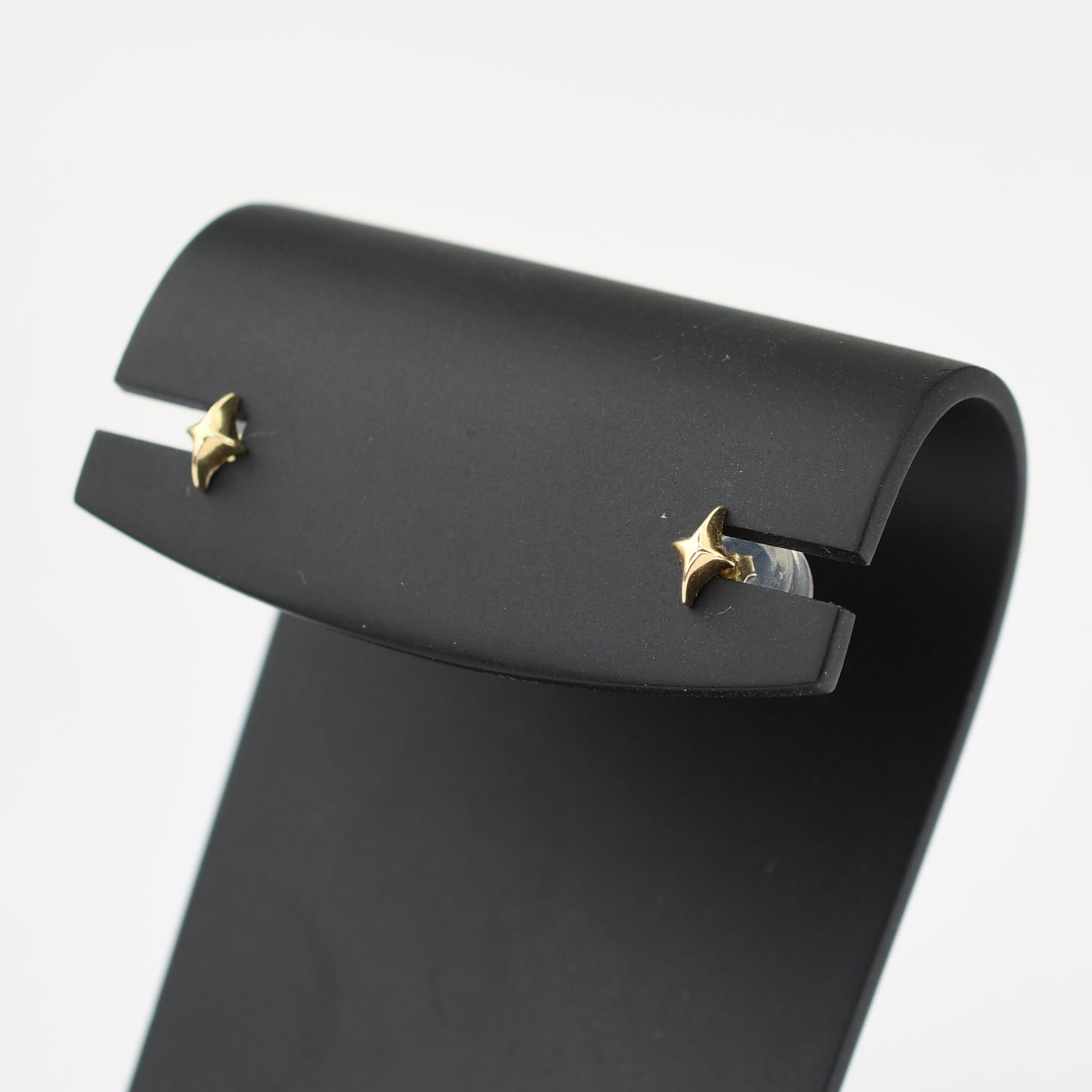 solid gold star stud and chain drop earrings
