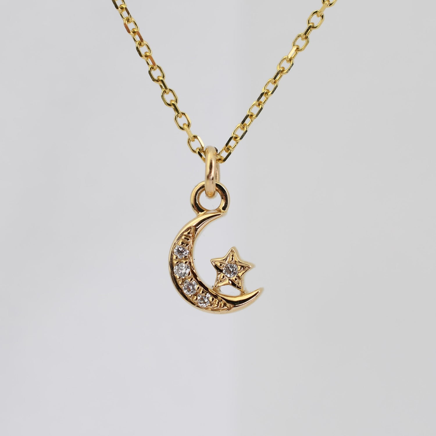 14K Gold Star & Moon Diamond Necklace