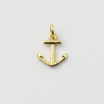 A small gold anchor charm pendant with a polished finish, shown on a plain white background.
