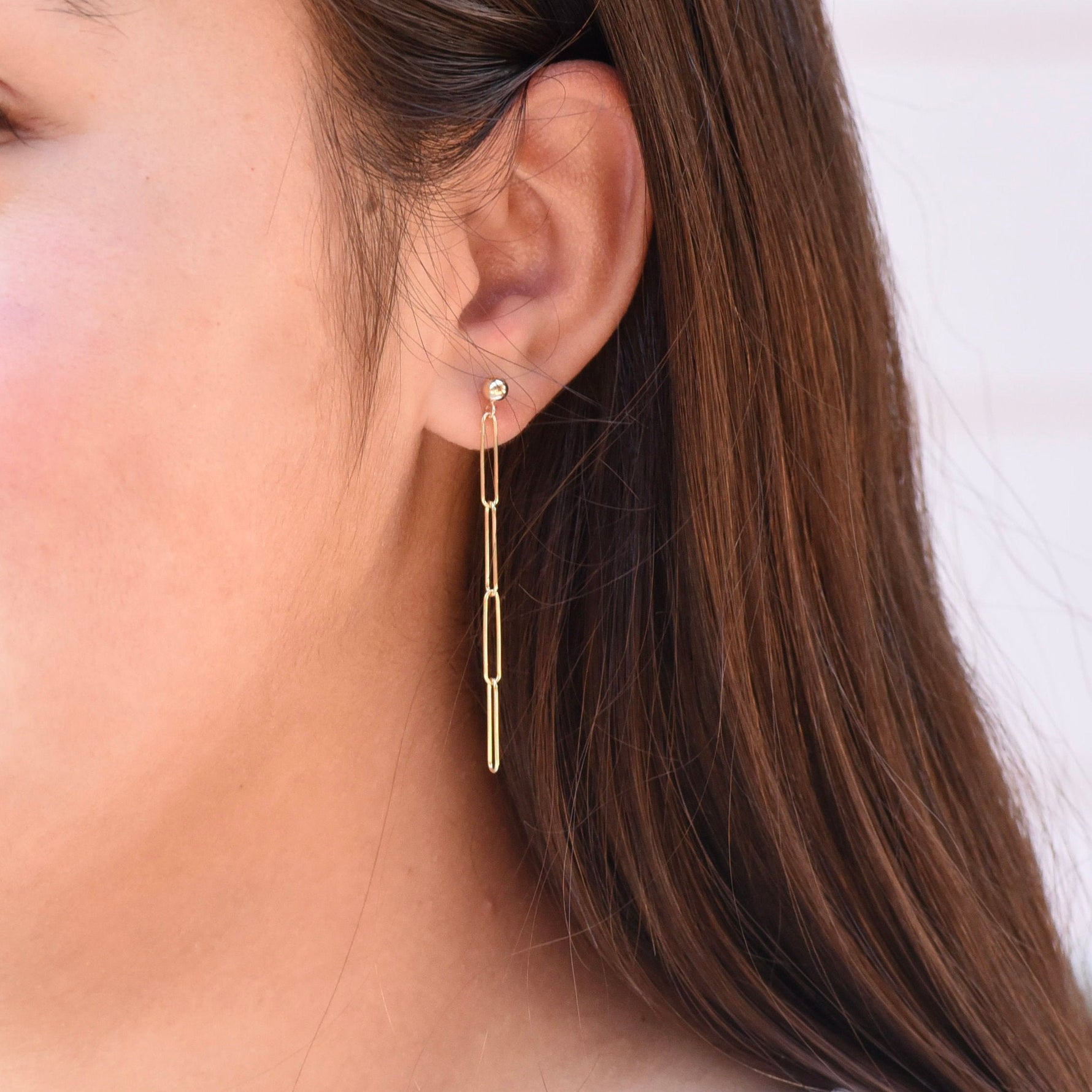 14k gold paper clip earrings close up