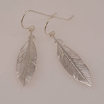 Sterling Silver Feather Earrings: Delicate Dangle Charm - Sash Jewelry