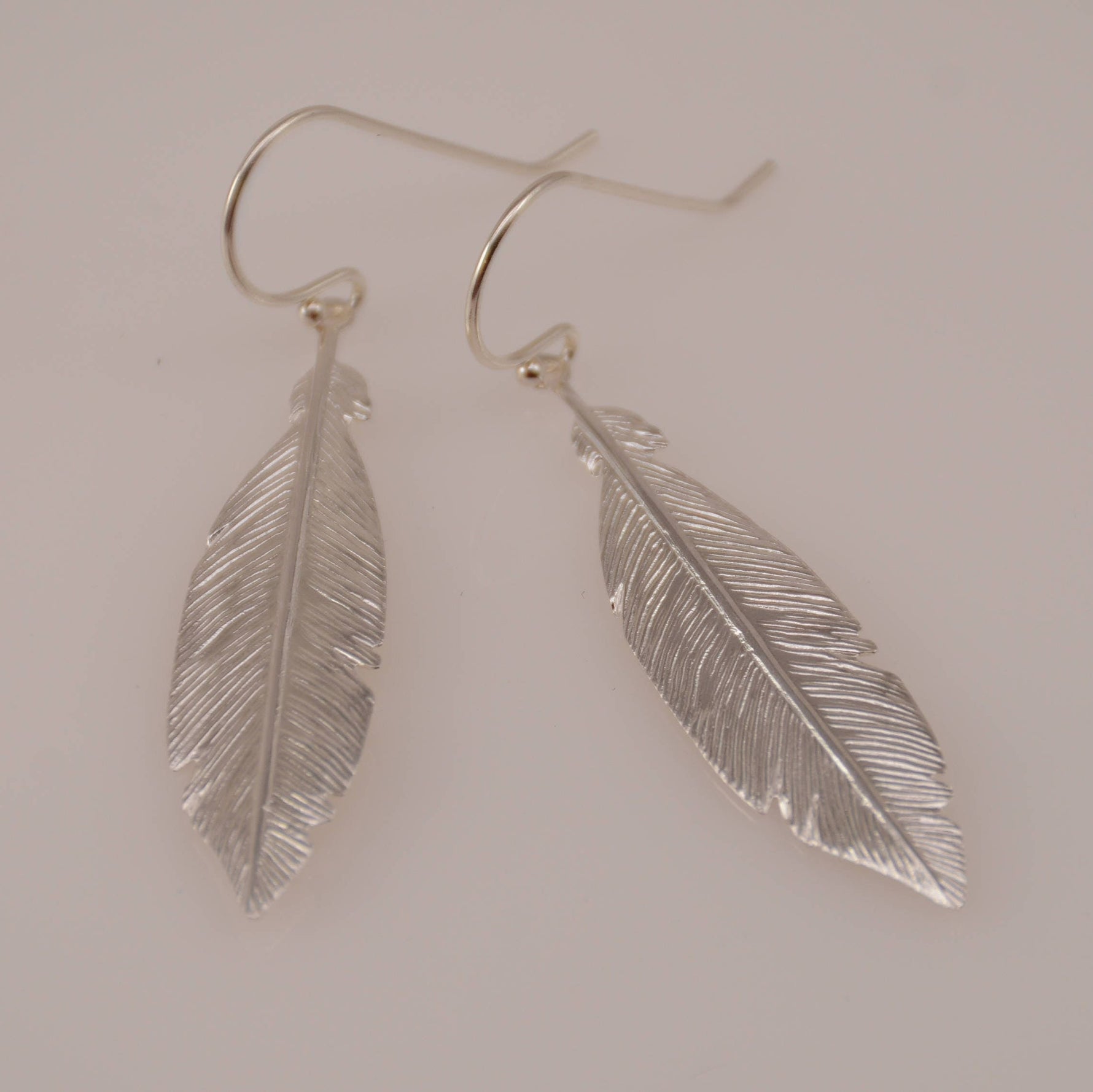 Sterling Silver Feather Earrings: Delicate Dangle Charm - Sash Jewelry