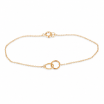 Gold bracelet with interlocking rings on a white background