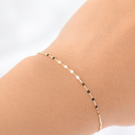 14K solid gold dapped link and drawn cable chain bracelet by Sash Jewelry, showcasing a shiny, elegant jewelry piece.