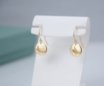 Gold disc earrings 14k