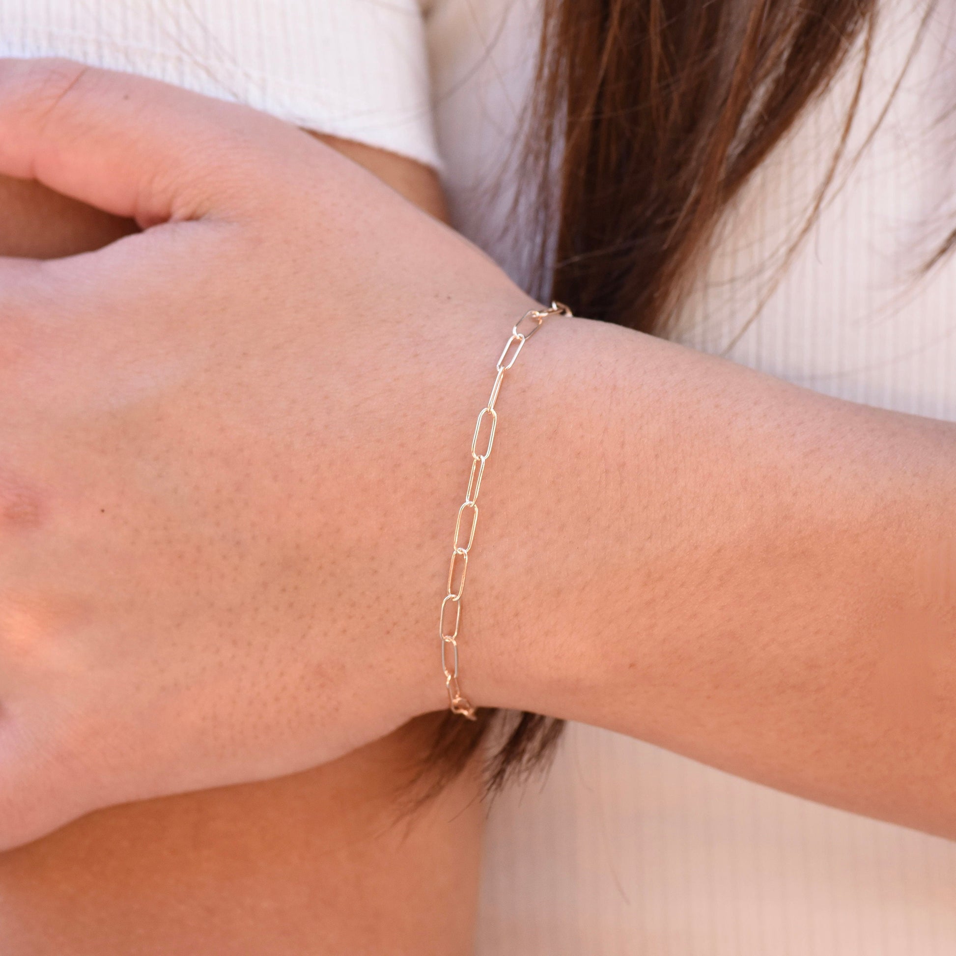 Minimalist 14K solid gold paper clip chain bracelet, 3mm wide. Perfect for everyday wear, stacking, or gifting. Durable, elegant, and timeless.