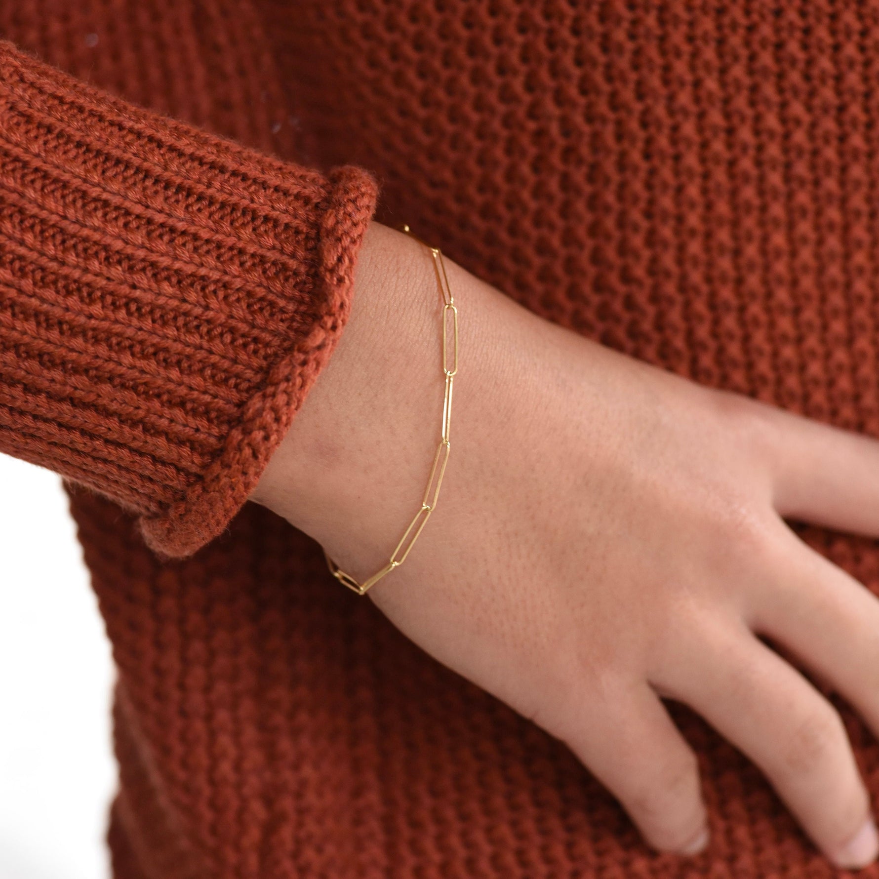 Minimal 14K solid gold paper clip chain bracelet close up