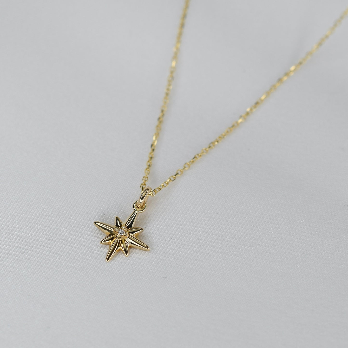 Shine bright with this dainty 14K solid gold North Star necklace, designed to symbolize guidance, protection, and inspiration.