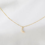 Celestial 14K gold moon necklace with fine cable chain