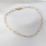 Minimalist 14K solid gold paper clip chain bracelet, 3mm wide. Perfect for everyday wear, stacking, or gifting. Durable, elegant, and timeless.